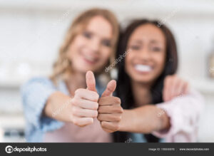 depositphotos 158930976 stock photo waitresses with thumbs up gesture